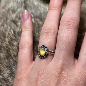Sterling silver bright yellow mother of pearl shell ring in twisted rope frame